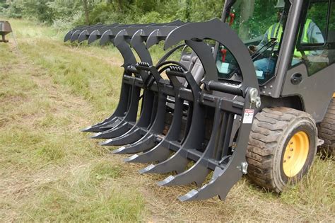 skid steer post grabber|skid steer root rake.